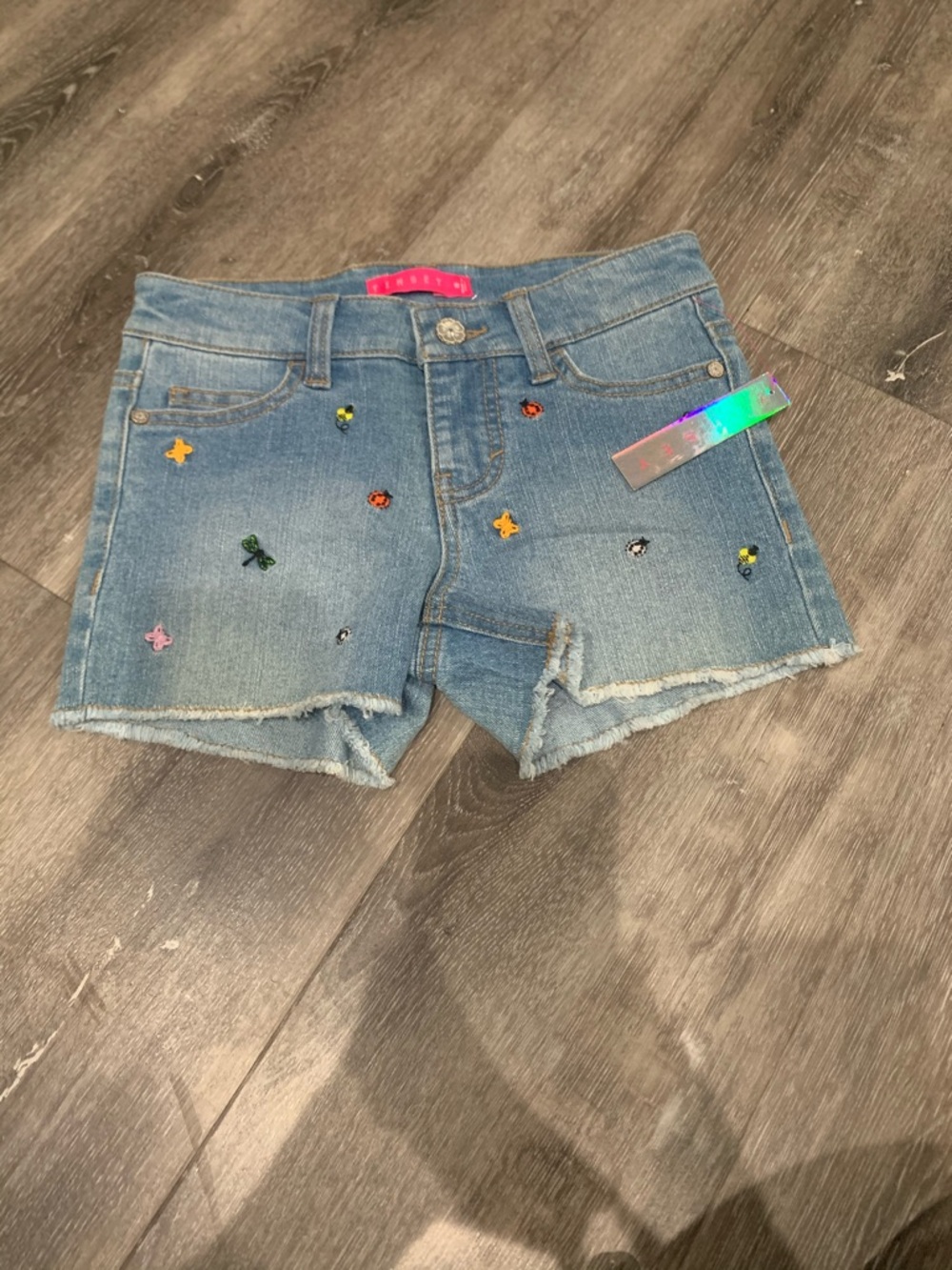 New Tinsey embroided butterly/lady bug shorts
size 8